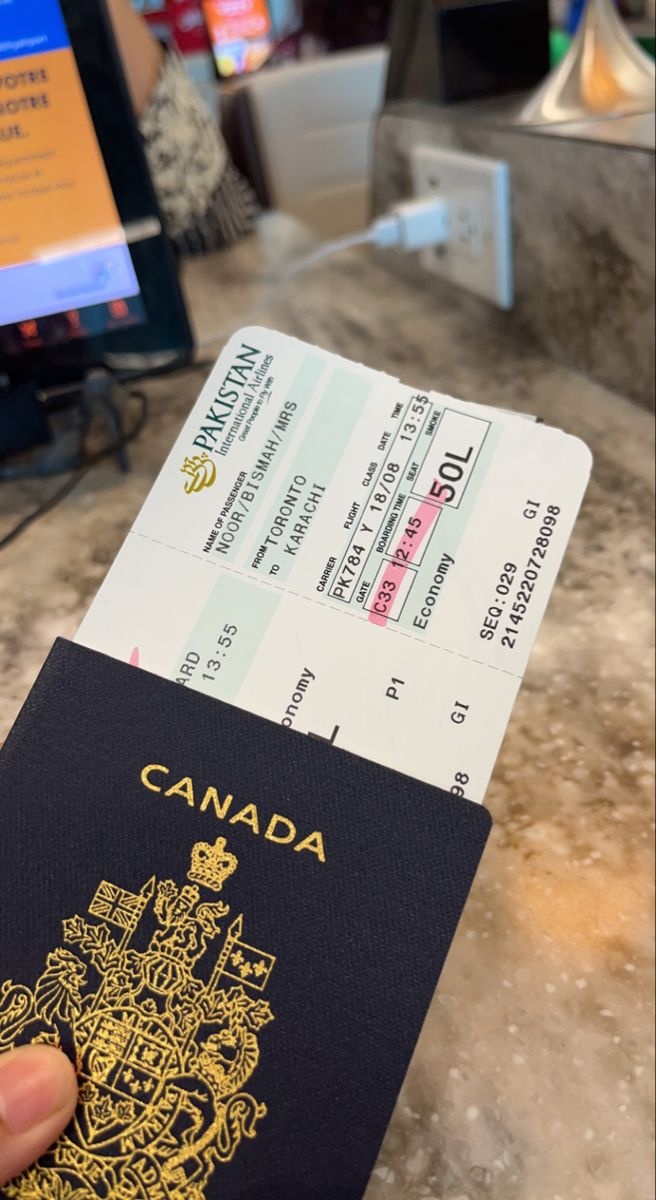 Canadian passport and travel documents photographed during a journey